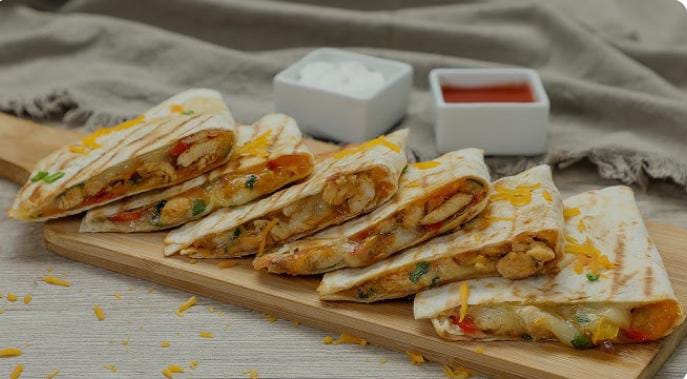 QUESADELA CHICKEN Calories 393, Protein 35, Carbs 40, Fat 18