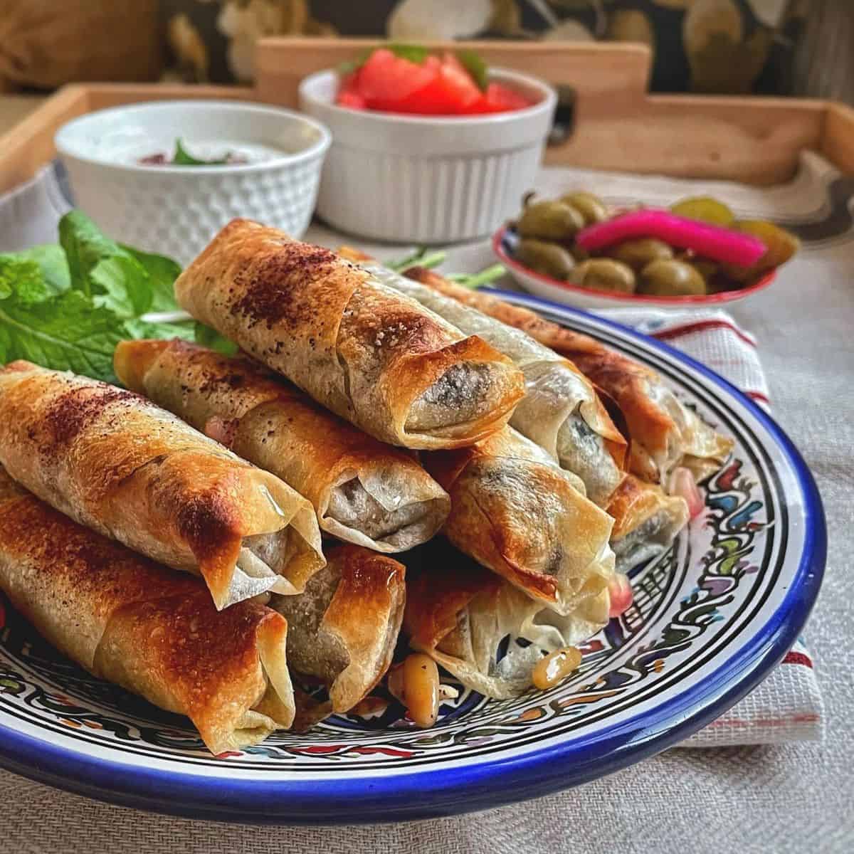 Chicken Musakhan . Calorie 377, Protein 37, Carbs 34, Fat 10.3
