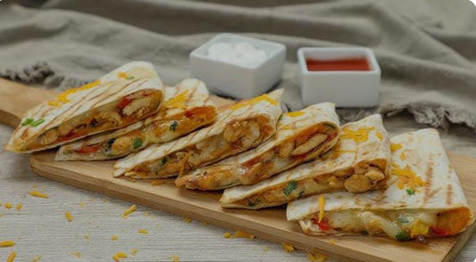 QUESADELA CHICKEN      Calories  393, Protein 35, Carbs 40, Fat 18